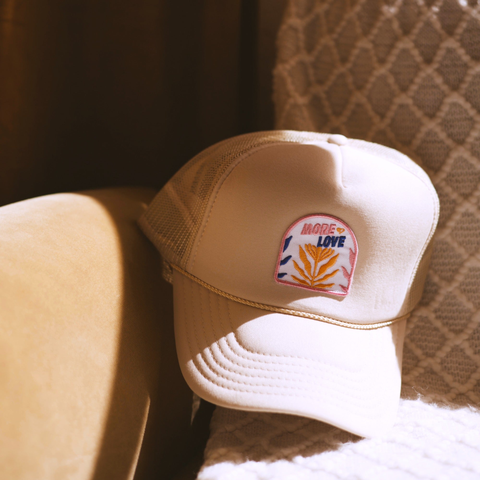 More Love Trucker Hat