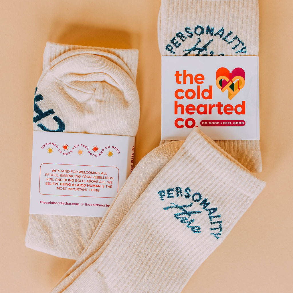 Personality Hire Socks, cream crew socks with green Personality Hire lettering, two pairs in Cold Hearted Co. bands