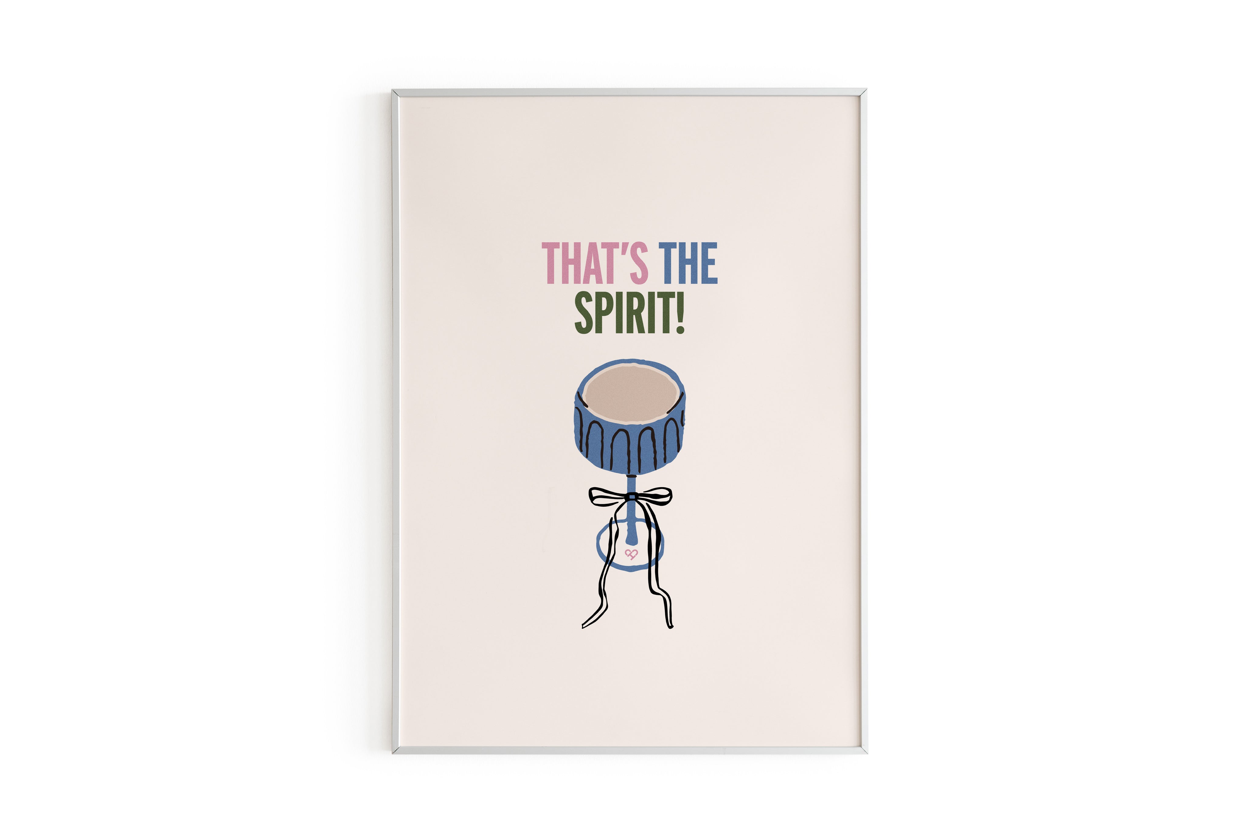 That's The Spirit Print, framed cream print with pink, blue and green text above a blue cocktail glass with a bow