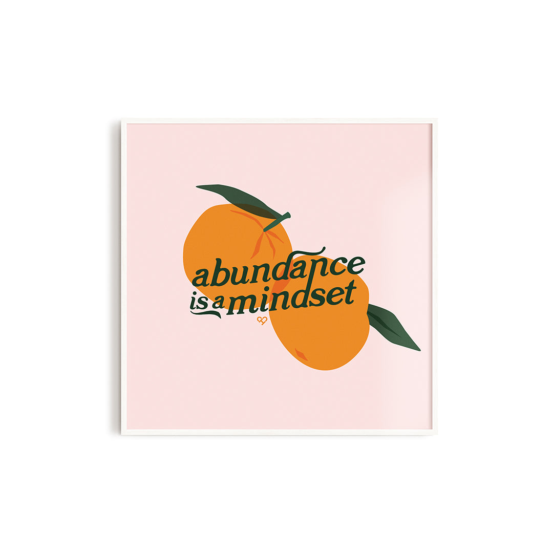 Abundance is A Mindset Print, framed square pink print of two oranges with leaves and green script lettering