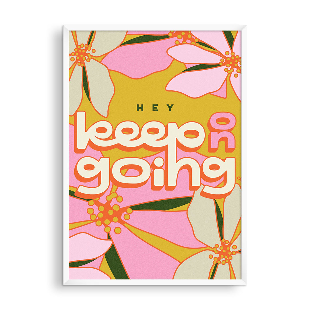 Keep Going Print, framed print reading Hey keep on going in cream lettering over big pink and white flowers on mustard